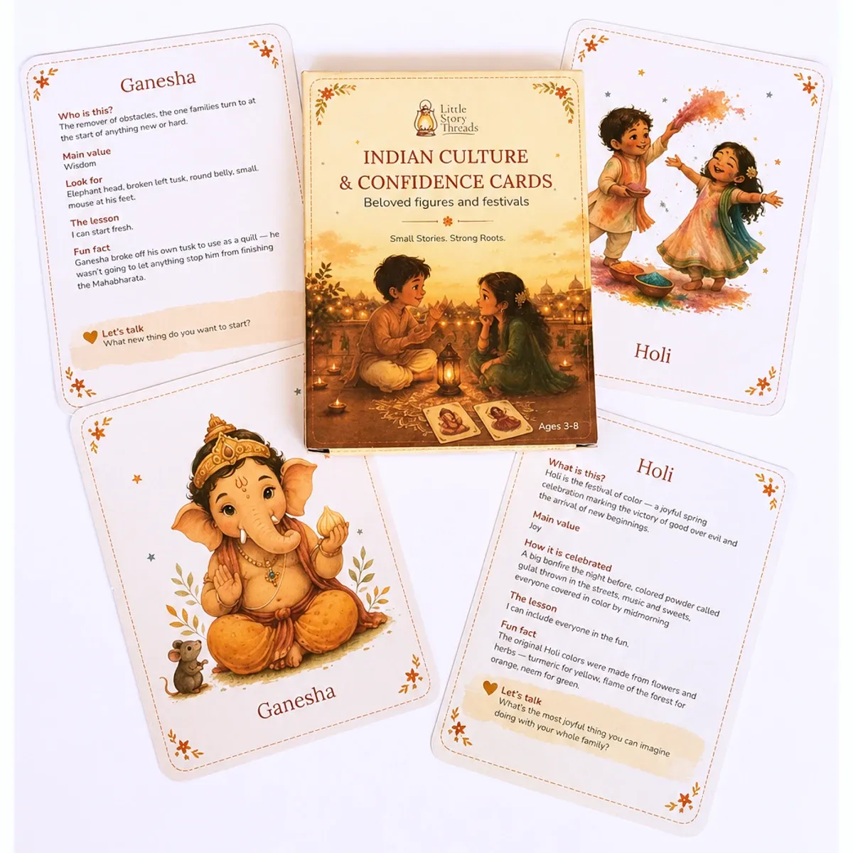 Four story cards fanned around the box - Ganesha and Holi, front and back - showing the illustration, story, and conversation prompt on each card.